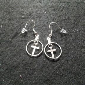 Silver Colored Cross In Loop Earring